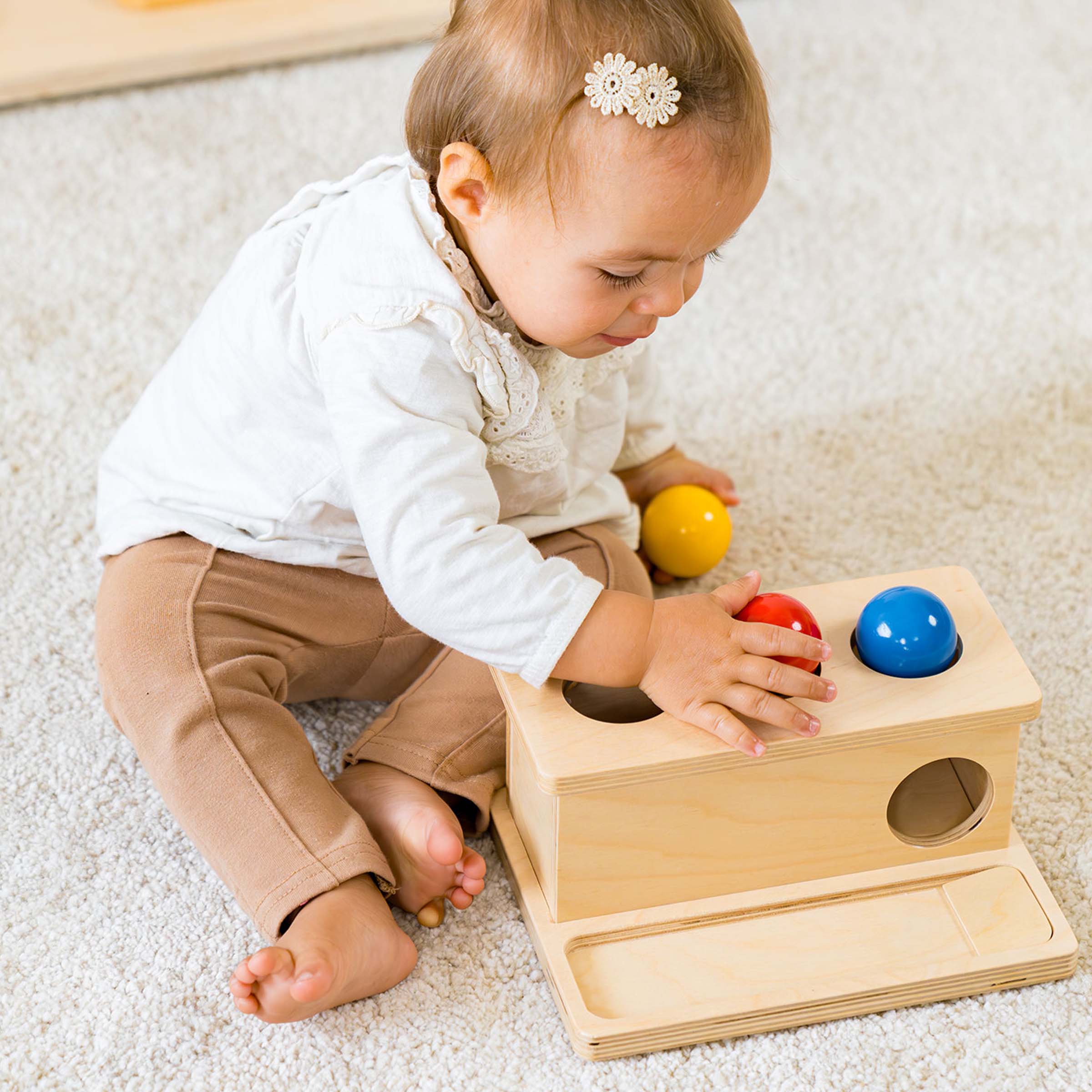 Bälle drücken - Montessori Bewegung