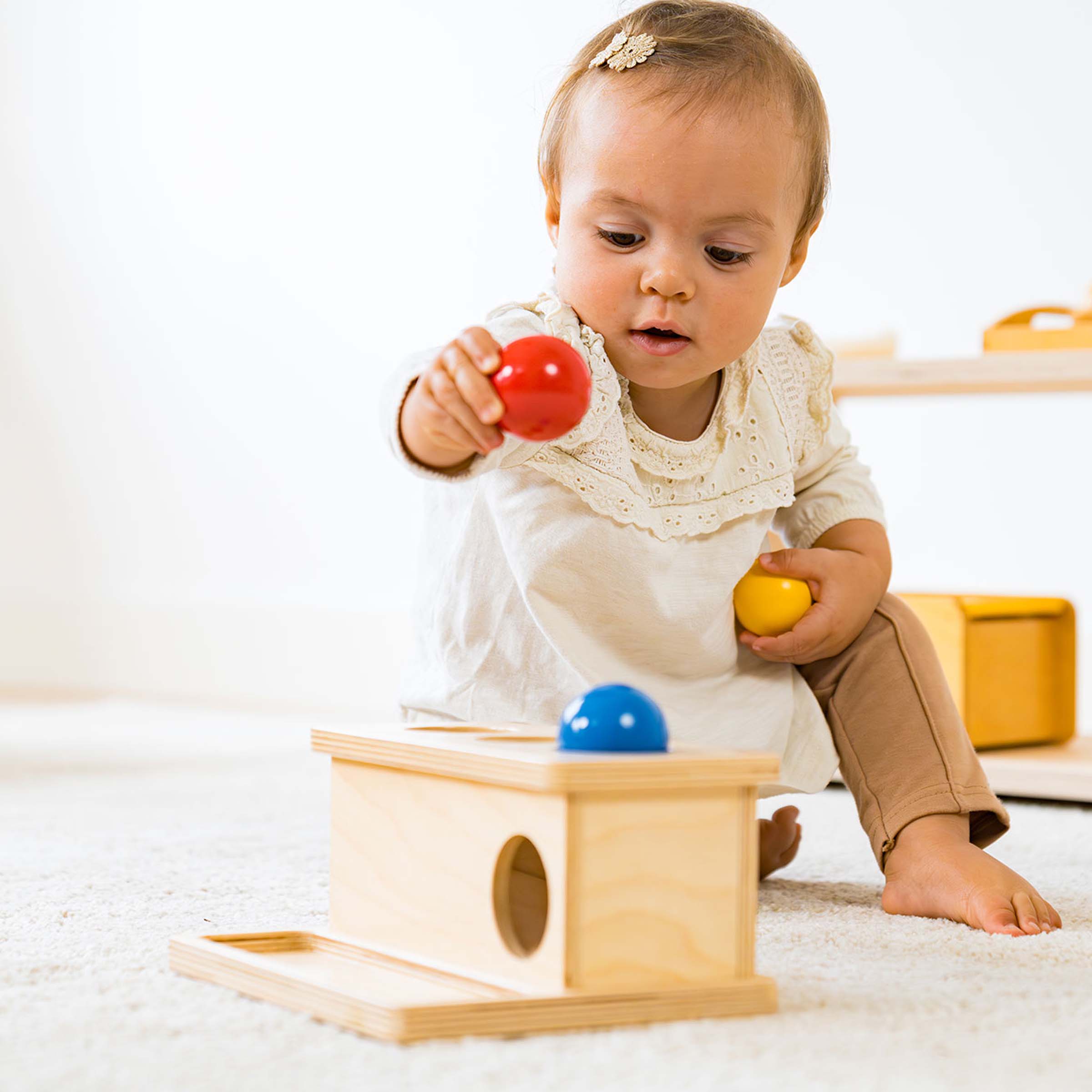 Bälle drücken - Montessori Bewegung